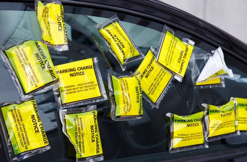 multiple-parking-ticket-on-car-window